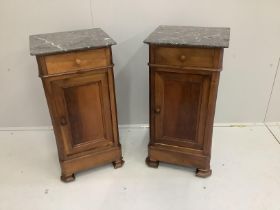 A pair of late 19th century French walnut bedside cabinets with grey marble tops, width 38cm***