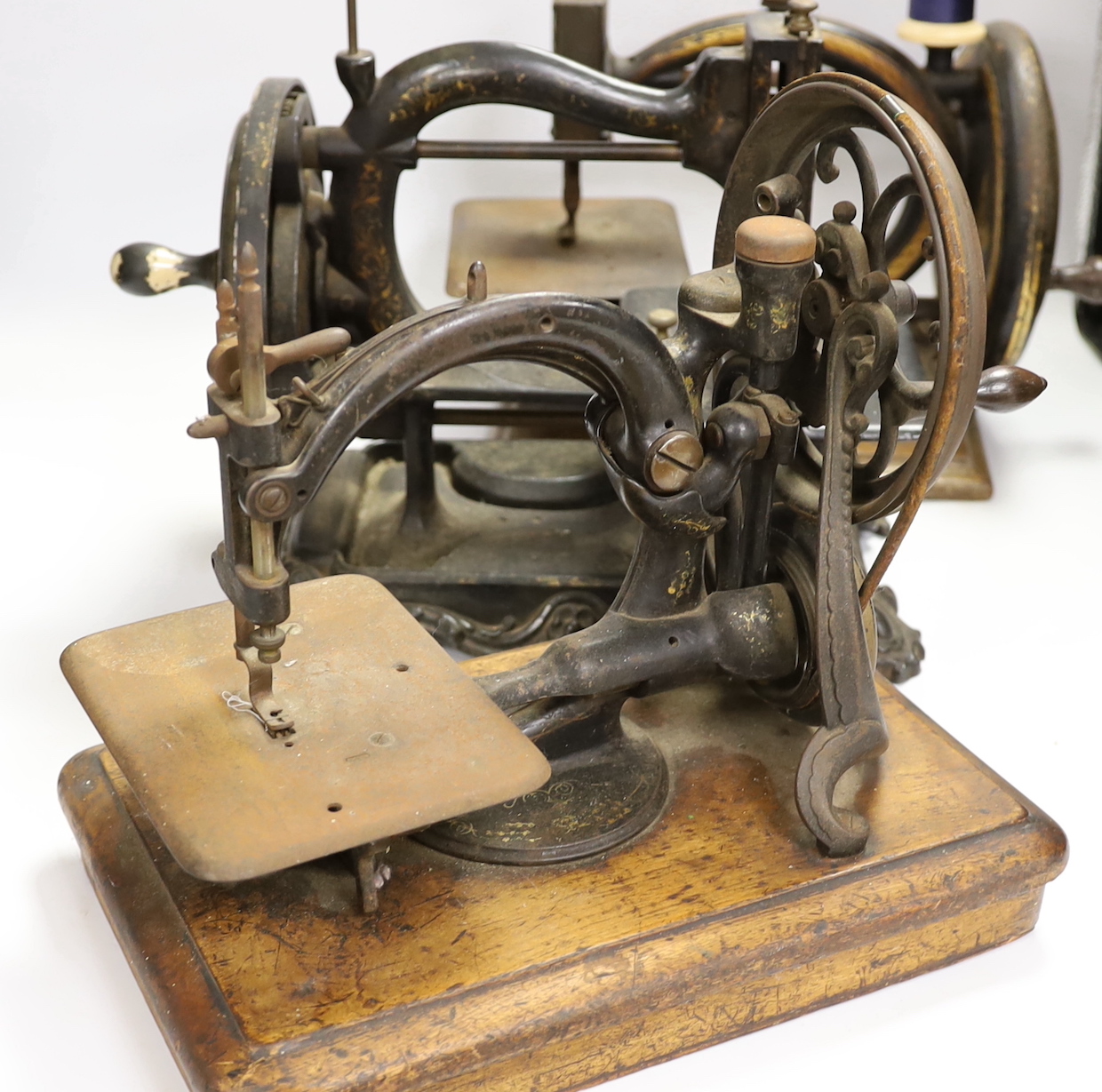 Three Victorian sewing machines, including Willcox and Gibbs and Smith ...