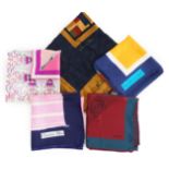 A selection of Yves Saint Laurent, two Christian Dior, Richel and Loewe silk scarves, YSL, blues