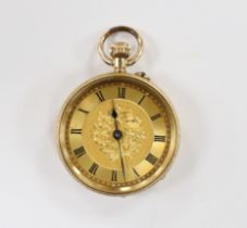 A lady's continental engraved 14k open face keyless fob watch, with Roman dial, gross weight 27.8