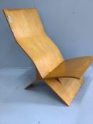 In the manner of Jens Nielson, a mid century bent ply two section chair, width 56cm, depth 80cm,