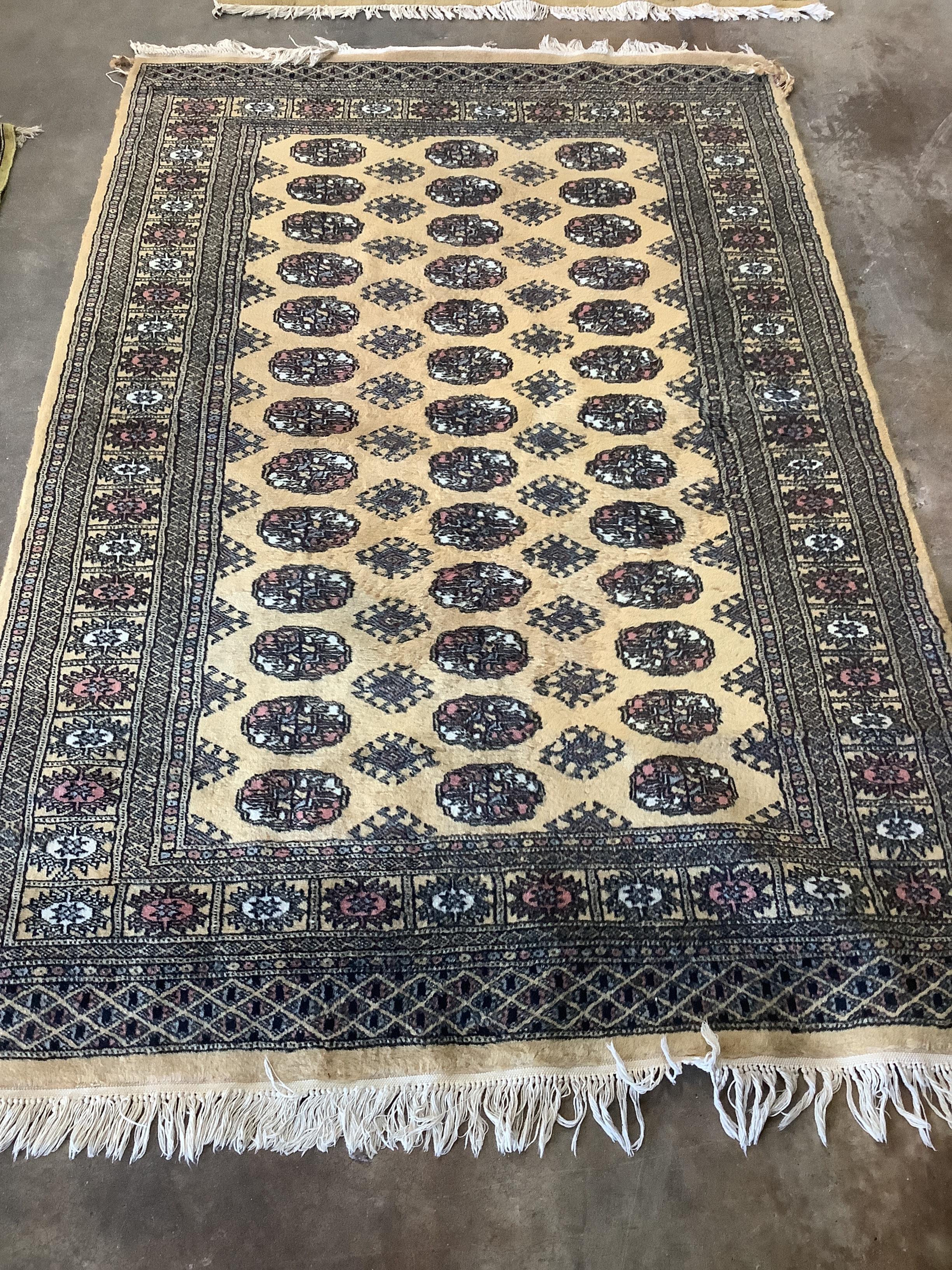 A Bokhara style cotton pile rug, 192 x 124cm***CONDITION REPORT***PLEASE NOTE:- Prospective buyers