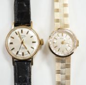 A lady's 9ct gold Eterna manual wind wrist watch, on a 9ct gold integral bracelet, overall 16.2cm,