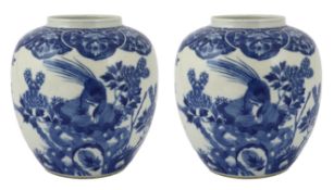 * * A pair of late 19th Chinese blue and white ginger jars, bearing Kangxi marks, c.1880Please