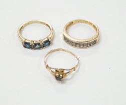 Two 9ct gold dress rings, one set with sapphire and diamonds, the other a single sapphire, and a