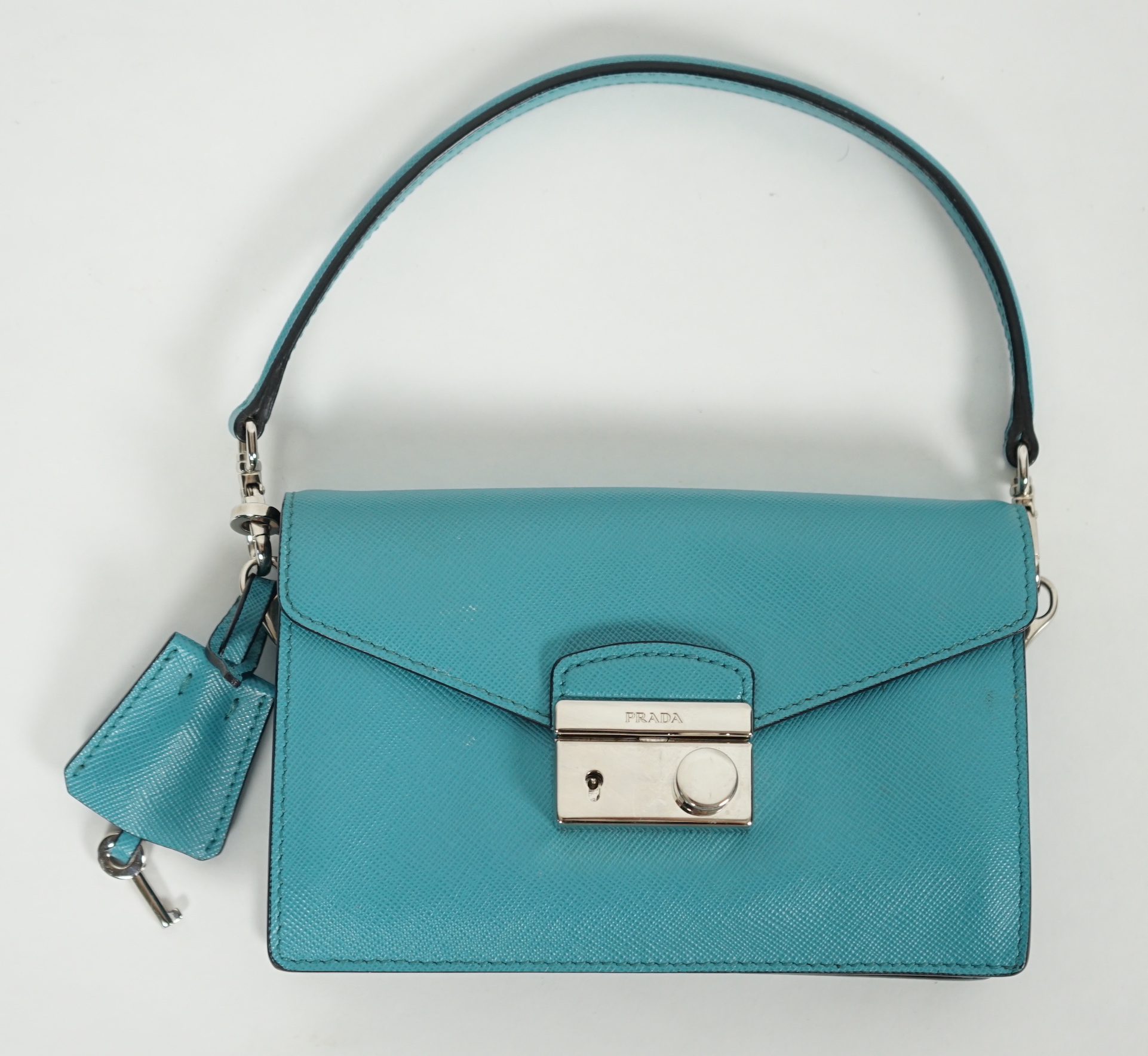 A Prada Saffiano Lux Mini Sound bag in Turchese, silver-tone hardware, with bag, box and - Image 2 of 8
