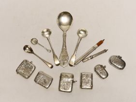 Six assorted early 20th century silver vesta cases, largest 45mm and a small quantity of sundry