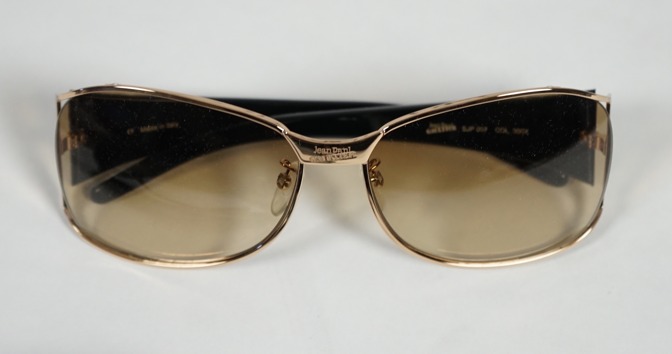 A pair of Paul Smith and a pair of Jean Paul Gautier lady's sunglasses with cases.***CONDITION - Image 5 of 6