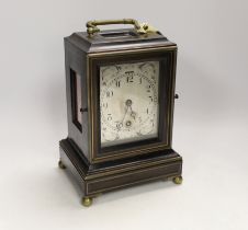 A mantel timepiece with balance escapement, silvered dial and ebonised case, 24cm***CONDITION