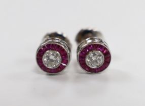 A pair of white metal, ruby and diamond set cluster target earrings, 8mm, gross weight 3.7 grams,