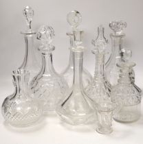 Seven decanters, all with stoppers, a carafe, a custard cup, tallest, decanter 34cm***CONDITION