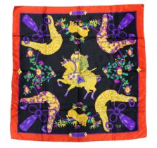 A Hermes silk scarf***CONDITION REPORT***PLEASE NOTE:- Prospective buyers are strongly advised to