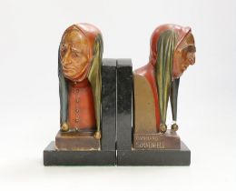 A pair of Gotthard Sonnenfeld painted wood bookends, granite bases, engraved, N.D.M, both with busts