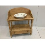 An Edwardian beech washstand with base drawer and associated ceramic basin, width 84cm***CONDITION