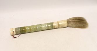 A mixed carved jadeite fly whisk, 39cm long***CONDITION REPORT***PLEASE NOTE:- Prospective buyers