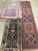 An Afghan runner, 250 x 58cm, a Belouch rug and one other rug (3)***CONDITION REPORT***PLEASE NOTE:-