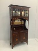 An Edwardian Arts and Crafts mahogany display cabinet with stencilled decoration, width 91cm, height