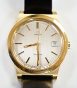 A gentleman's steel and gold plated Omega manual wind wrist watch, with date aperture, on an Omega