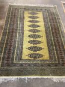 A Bokhara style rug, 177 x 129cm***CONDITION REPORT***PLEASE NOTE:- Prospective buyers are