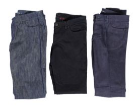Three pairs of Prada lady's jeans Prada, black denim with side zips, size 27Prada lightweight blue