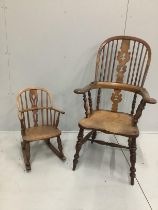 A 19th century turned comb back elm, ash and beech Windsor elbow chair with pierced splat, height