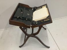 A late Victorian mahogany travelling artist's / draughtman's table with fitted leather lined