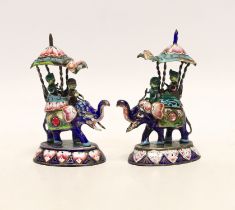 A pair of Indian gilt white metal and polychrome enamel elephants with howdahs, height 77mm.***