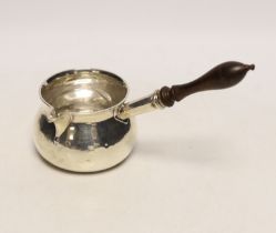 A George III silver brandy warmer, with turned wooden handle, Charles Chesterman II, London, 1786,