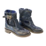 A pair of Chanel lady's navy blue leather calf hair pleated belted buckle boots, with blue tartan