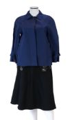 A Prada black A line wool skirt with silver embellishment on the pockets, a blue cotton canvas short