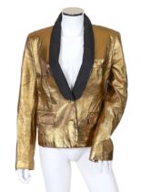 A lady's Dolce & Gabbana gold metallic leather jacket, with black lapels and leopard print lining,