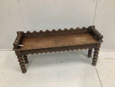 A late Victorian carved oak window seat, width 123cm***CONDITION REPORT***PLEASE NOTE:-
