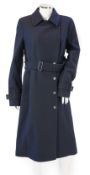 A Burberry lady's navy wool trench coat with chrome buttons, size UK6***CONDITION REPORT***unused,