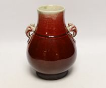 A Chinese sang de boeuf glazed pear-shaped vase, hu, late 19th/early 20th century, 21cm***