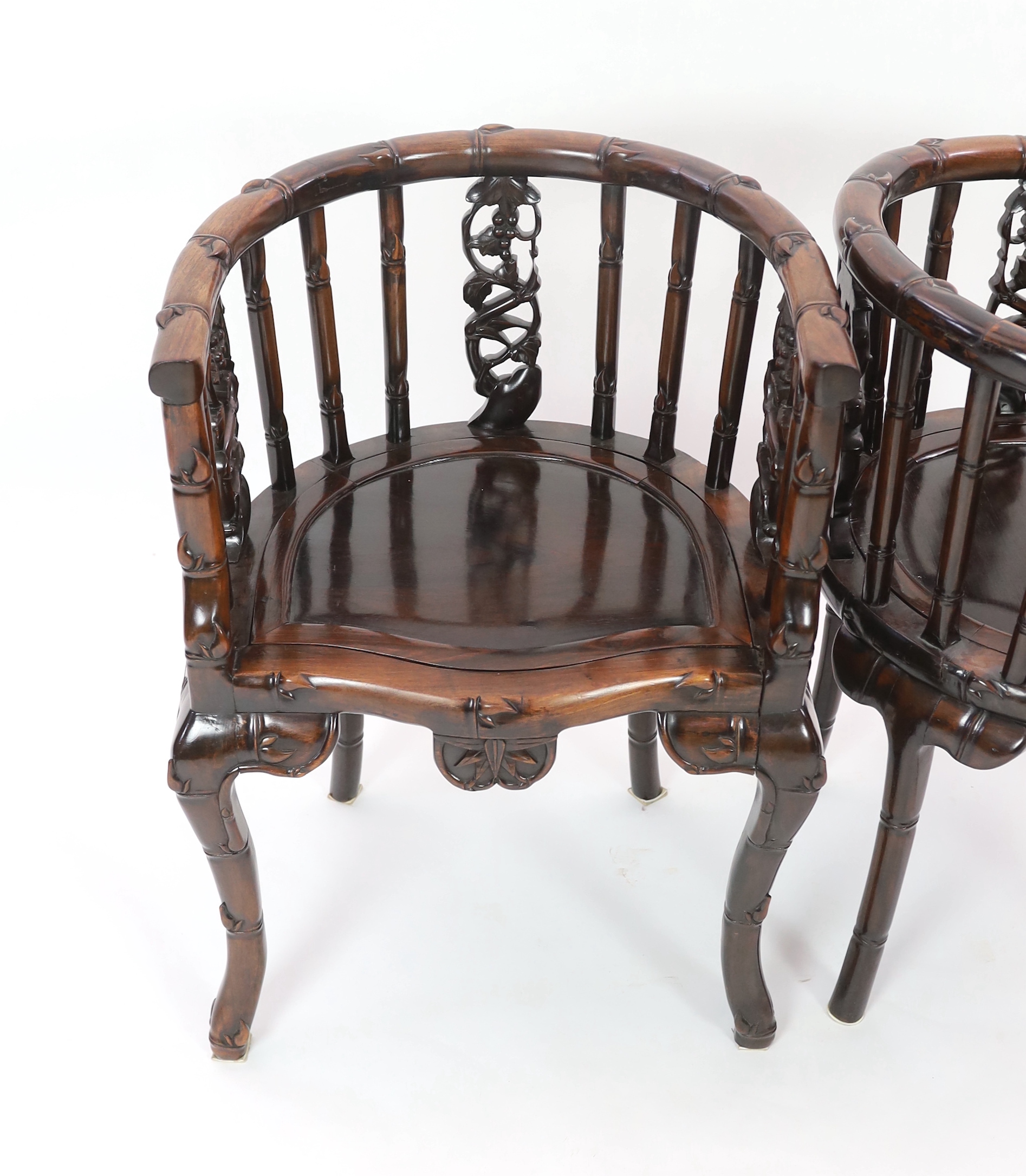 A pair of Chinese hongmu tub-shaped armchairs, late 19th century, carved in imitation of bamboo - Image 2 of 3