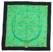 A Hermès 'Clips' 1986 Vladimir Rybaltchenko silk scarf, in vibrant green and gold with navy blue