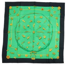 A Hermès 'Clips' 1986 Vladimir Rybaltchenko silk scarf, in vibrant green and gold with navy blue