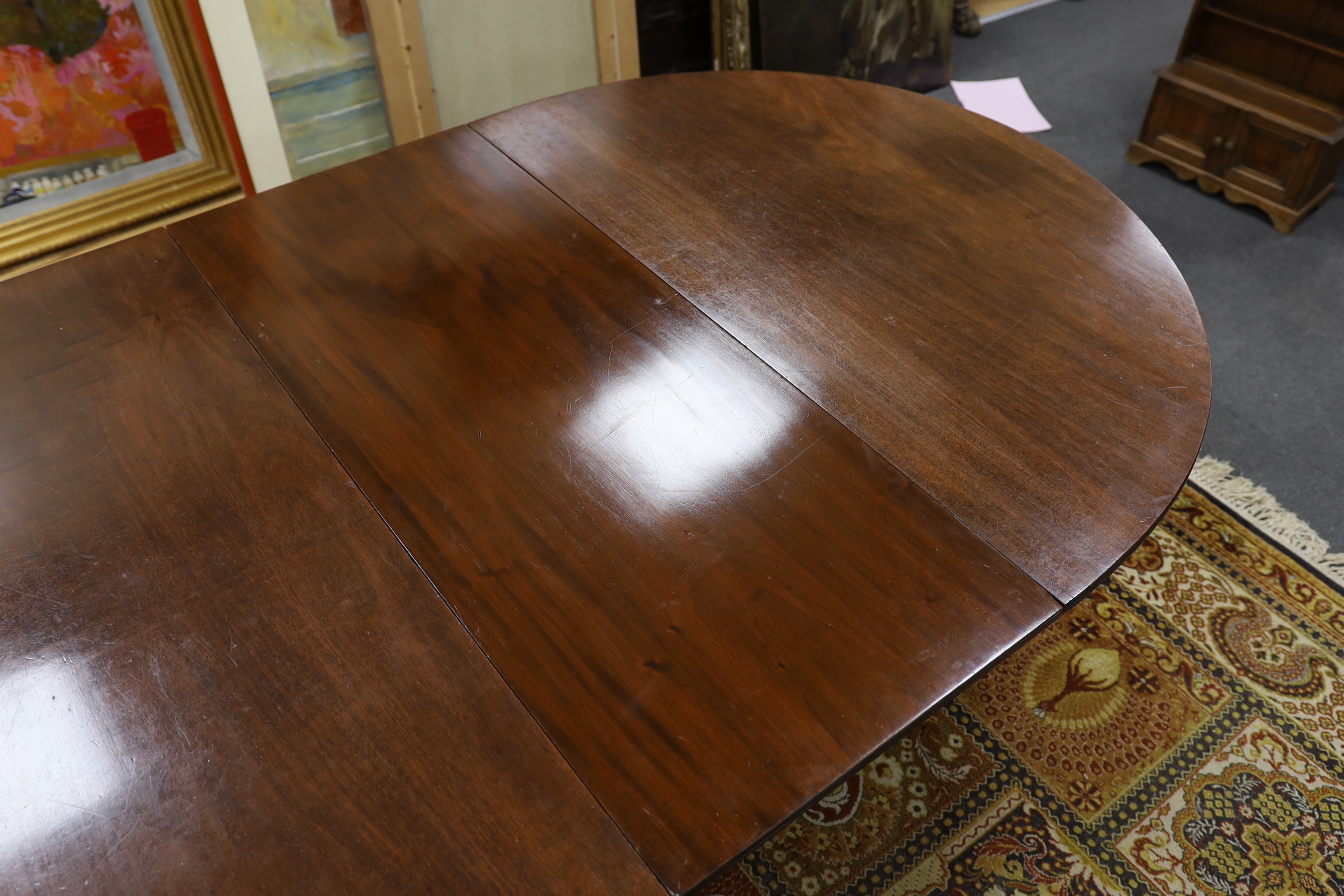 A George III style mahogany triple pillar D end extending dining table in the manner of Gillows, - Image 6 of 6