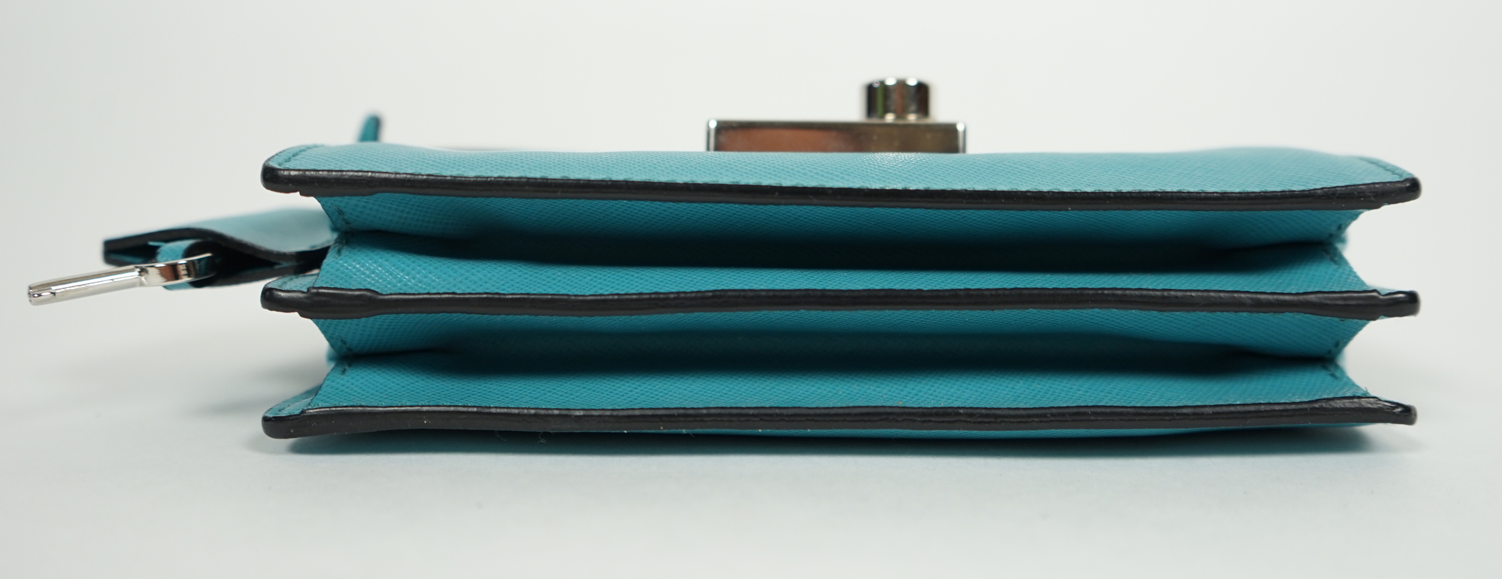 A Prada Saffiano Lux Mini Sound bag in Turchese, silver-tone hardware, with bag, box and - Image 6 of 8
