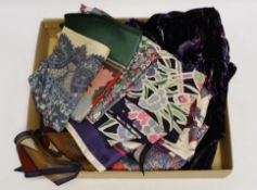 A collection of thirteen Liberty printed scarves***CONDITION REPORT***PLEASE NOTE:- Prospective