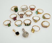 Thirteen assorted modern 9ct gold of 9k and gem set dress rings and a 9ct gold and gem set