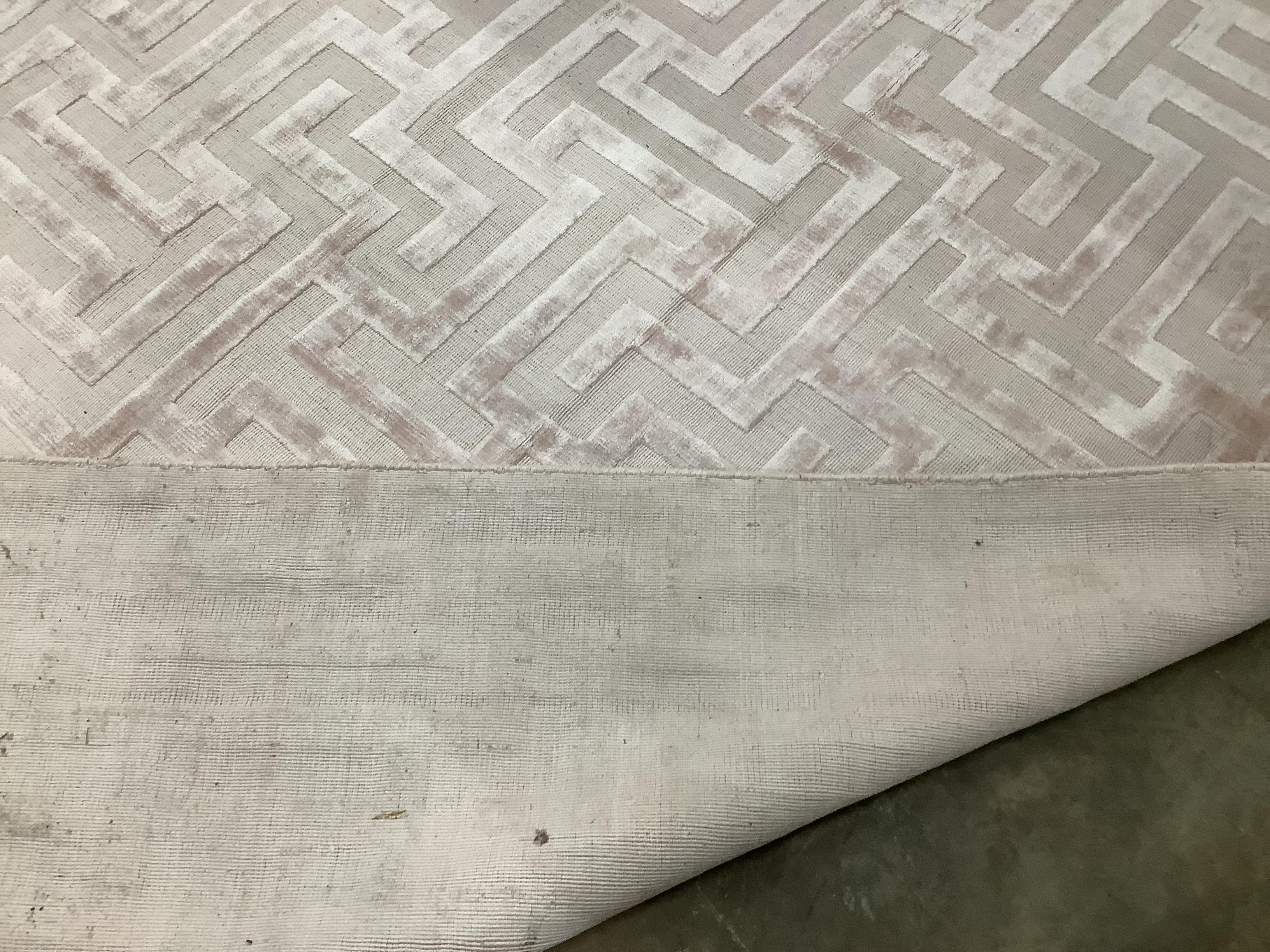 A contemporary part silk peach geometric carpet, 300 x 200cm***CONDITION REPORT***PLEASE NOTE:- - Image 2 of 2