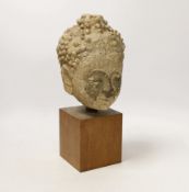A South East Asian limestone head of Buddha, 29cm***CONDITION REPORT***PLEASE NOTE:- Prospective