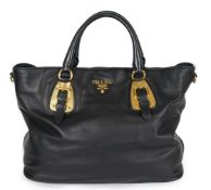 A Prada Vitello black leather bag with detachable strap, gilt metalware with dust bag, width 40cm,