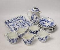 Fourteen Meissen items including a coffee pot, five cups and saucers, a square dish and oval dish,