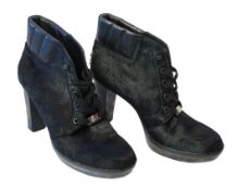 A pair of Tod's black calf hair and leather trim lace up ankle boots, size EU 39***CONDITION