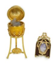 A Fabergé Imperial Collection Menagerie Rabbit Surprise Egg on stand together with a Fabergé gilt