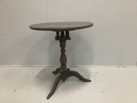 A mid 18th century oak tripod table with bird cage stem, width 60cm, height 63cm***CONDITION