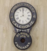 An early 20th century American Baird Clock Co. advertising wall clock “Singali Valley & Calcoolie