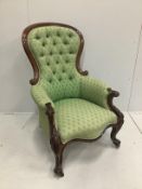 A Victorian carved mahogany button back armchair***CONDITION REPORT***PLEASE NOTE:- Prospective